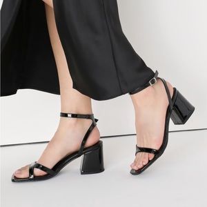 Eldie Black Patent Ankle
Strap High Heel Sandals